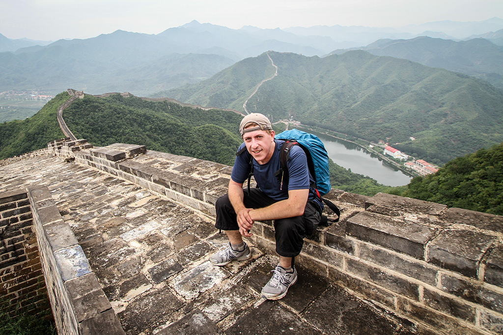 Travis atop the Great Wall of China